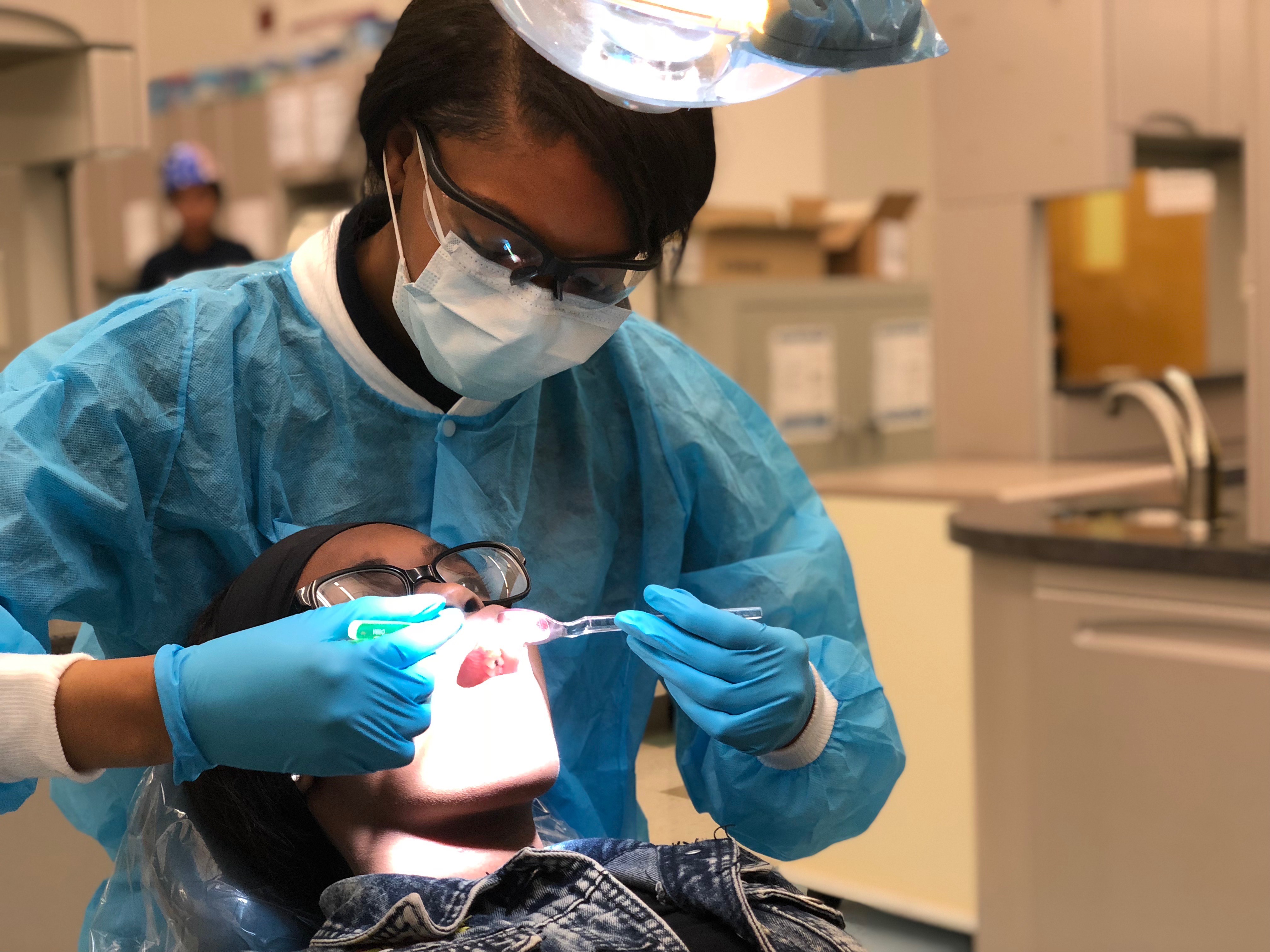 Oral Health students learn hygienist procedures.